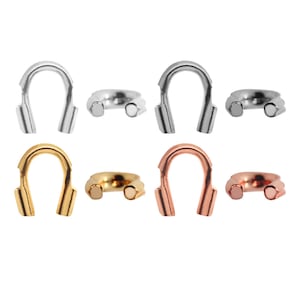 Könnte beinhalten: Sechs Crimp-End-Perlenkappen in drei verschiedenen Metalloberflächen: Silber, Gold und Roségold. Die Kappen sind für die Verwendung mit Schmuckzubehör konzipiert.