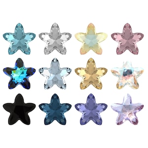 Puede incluir: Doce cristales de imitación en forma de estrella en varios colores, incluyendo azul, verde, rosa, morado y negro.