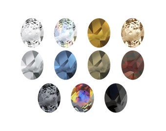 May include: Assortment of oval-shaped, faceted gemstones in various colors, including clear, light blue, gold, beige, silver, dark blue, brown, red, black, and iridescent.