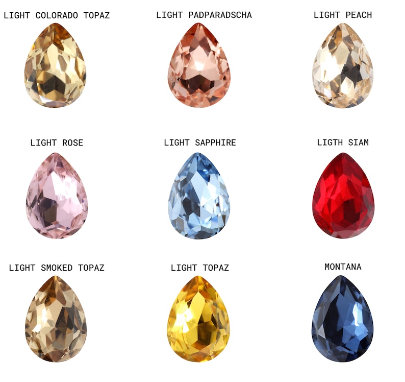 May include: Nine teardrop-shaped crystal beads in various colors, including light Colorado topaz, light padparadscha, light peach, light rose, light sapphire, light Siam, light smoked topaz, light topaz, and Montana.