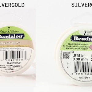 May include: Two spools of Beadalon 7-strand beading wire. The spool on the left is silvergold and the spool on the right is silverrose. Both spools are 100 feet (31 meters) long and have a diameter of 0.015 inches (0.38 millimeters).