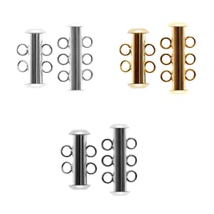 Könnte beinhalten: Vier silberne, goldene und schwarze Metallverschlüsse für Halsketten oder Armbänder. Jeder Verschluss hat vier Schlaufen zum Anbringen mehrerer Schmuckstränge.