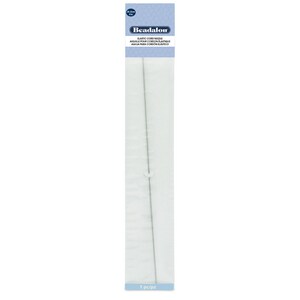 May include: A silver elastic cord needle, 25 inches long, packaged on a white card with blue text that reads "Beadalon Elastic Cord Needle Aiguille pour cordon &eacute;lastique Aguja para cord&oacute;n el&aacute;stico 1 pc/pz".