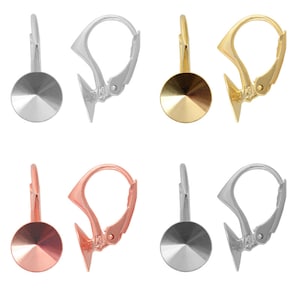 May include: A selection of leverback earring findings in silver, gold, and rose gold hues. Each earring finding has a round, faceted disc and a hinged leverback clasp. The findings are shown against a white backdrop.