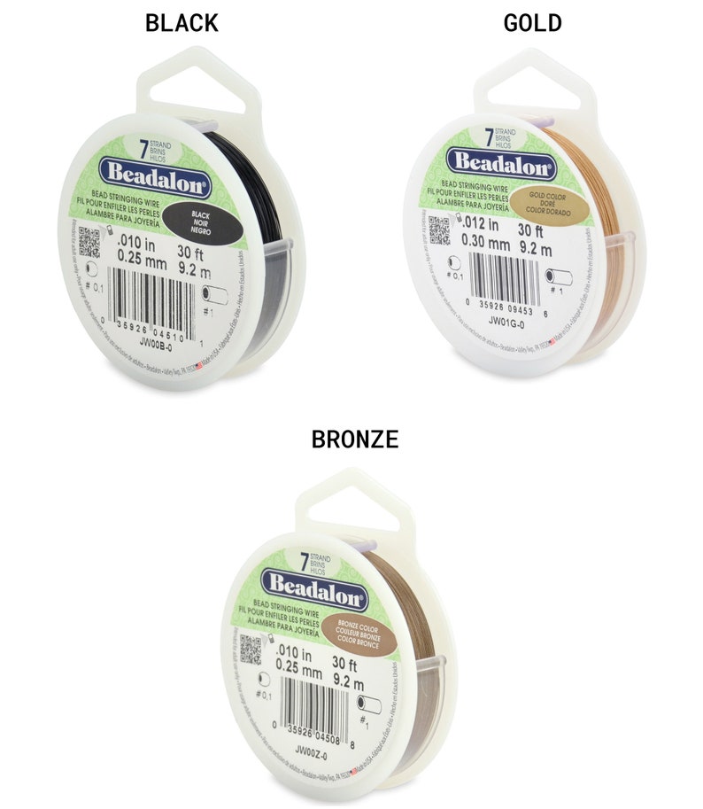 May include: A spool of 7-strand Beadalon bead stringing wire in black, gold, and bronze. The wire is 0.010 inches thick and 30 feet long. The spool is labeled with the Beadalon brand name and the wire's thickness and length.