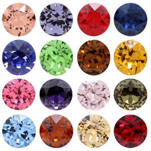 Op de afbeelding: Assortiment van 16 ronde edelstenen in verschillende kleuren, waaronder rood, blauw, groen, paars, roze, bruin en oranje. De edelstenen zijn gerangschikt in een rasterpatroon op een witte achtergrond.