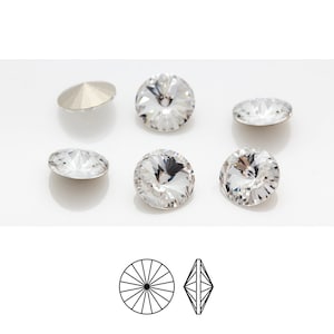 May include: Five clear crystal rhinestones with a flat back and a faceted top. The rhinestones are arranged in a semi-circle on a white surface. A line drawing of the rhinestone's top and side view is shown below.