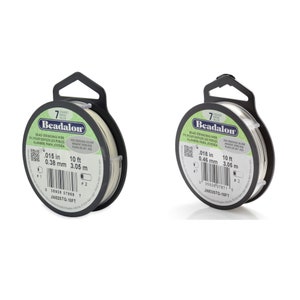 May include: Two spools of 925 sterling silver bead stringing wire. Each spool is 10 feet long and has a diameter of 0.015 inches or 0.38 millimeters. The spools are labeled "Beadalon" and have a barcode.