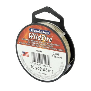 May include: Beige Beadalon WildFire thermally bonded bead weaving thread, 20 yards (18.3 meters), 0.006 inches (0.15 mm) thick.  Intended for adult use only.