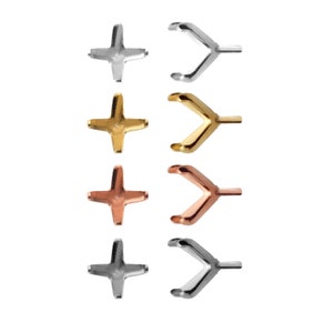 May include: Four sets of prong settings for gemstones. Each set includes a prong setting in the shape of a cross and a prong setting in the shape of a V. The prong settings are shown in silver, gold, rose gold, and black.
