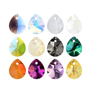 May include: Twelve teardrop-shaped crystal pendants in a variety of colours. The pendants are iridescent, clear, and coloured, including shades of orange, purple, green, and yellow. Each pendant has a small hole at the top for stringing.