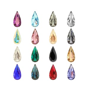 Puede incluir: Surtido de 18 piedras de cristal de imitación en forma de lágrima en varios colores, incluyendo transparente, azul, verde, rojo, rosa, negro y gris.