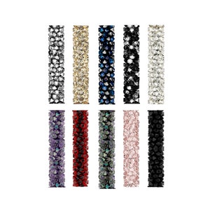 May include: Ten rows of crystal beads in various colors, including black, white, silver, gold, red, blue, purple, pink, and green. The beads are arranged in a vertical line, creating a decorative and eye-catching display.