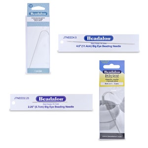 May include: Three packages of Beadalon big eye beading needles. The packages are white with blue text and show the needles in different sizes: 2.25 inches, 4.5 inches, and 3.5 inches. The needles are silver and have a large eye for easy threading.