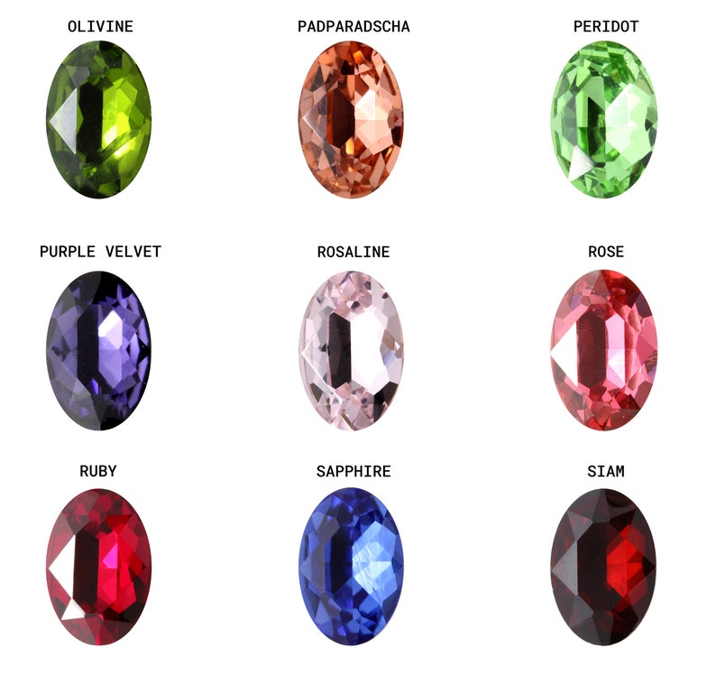 Pode incluir: Nove gemas ovais em diferentes cores, incluindo verde, marrom, rosa, roxo, vermelho e azul. Cada gema &eacute; etiquetada com seu nome: Olivina, Padparadscha, Peridoto, Veludo Roxo, Rosalina, Rosa, Rubi, Safira e Siam.