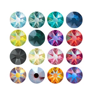 May include: Assortment of 16 round, faceted, iridescent glass rhinestones in various colours, including blue, green, yellow, red, pink, black, and orange.