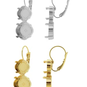 May include: Two pairs of earring settings, one pair in silver and one pair in gold. Each setting has two round bezels for stones, and a leverback closure.