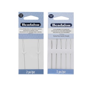 May include: Two packages of Beadalon collapsible big eye beading needles. The package on the left contains two needles and the package on the right contains five needles. Both packages are white with blue text and images of the needles.