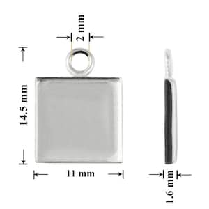 May include: Silver square pendant with a 1.6 inch by 1.6 inch frame and a 2 mm jump ring. The frame is 1.45 inches tall and 1.1 inches wide.