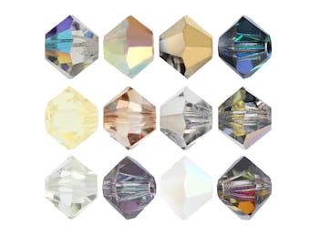 Op de afbeelding: Twaalf geassorteerde kristallen kralen in verschillende kleuren, waaronder helder, goud, zilver en paars. De kralen zijn gefacetteerd en hebben een ronde vorm.