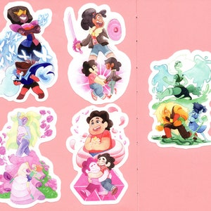 May include: Six colorful stickers featuring characters from the animated television series Steven Universe. The stickers feature Garnet, Pearl, Amethyst, Steven, Connie, Peridot, Lapis Lazuli, and Yellow Diamond.