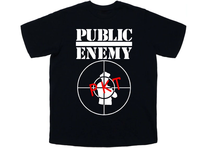 May include: Black t-shirt with white text that reads "PUBLIC ENEMY" and a white target symbol with a red "PKT" inside.