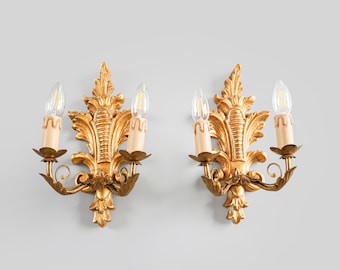 Pair of gilt wood Florentine wall lamps, 1960s, Italy.