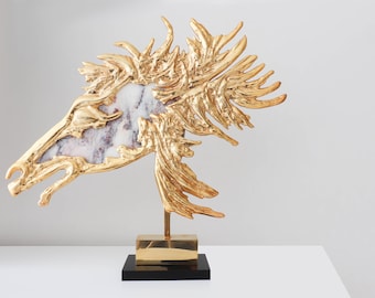 A gilded horse head sculpture by French Sculptor Philippe Cheverny