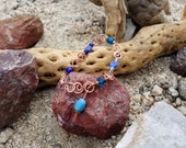 Hand-made hammered copper and blue glass bracelet, one of a kind.