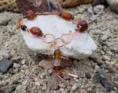 Hand-made hammered copper and lampwork glass bead bracelet, one of a kind.
