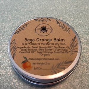 The Beekeeper's Farms own Sage Orange Balm!!  A soft balm to moisture dry skin.  2 oz size tin