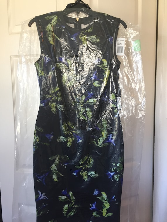 green emerald velvet dress Andrew Marc Women's Sleeveless Mesh Yoke Tucking Trim Shift Dress, Black,  Large at Amazon Women's Clothing store