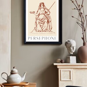 May include: A line drawing of Persephone, the Greek goddess of the underworld, in a seated pose. She is holding a bowl in her left hand and a staff in her right hand. The drawing is in brown on a cream background. The text "PERSEPHONE" is below the image.