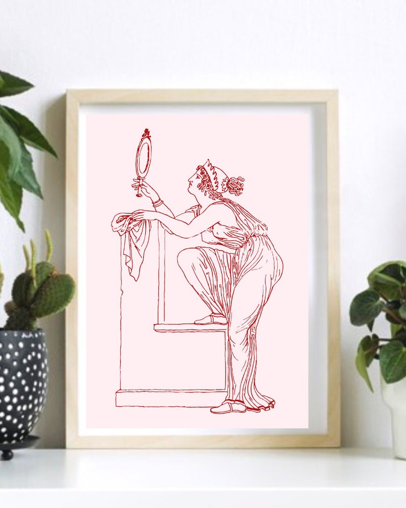 May include: A red line drawing of a woman in a long dress looking at a hand mirror. The woman is standing on a platform with a draped cloth.