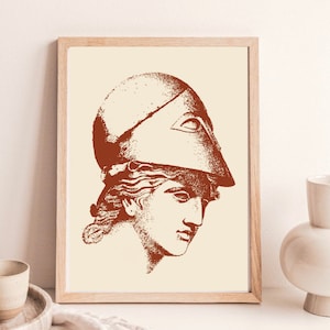 May include: A framed print of a vintage illustration of a woman's head wearing a helmet. The illustration is in shades of brown and cream.