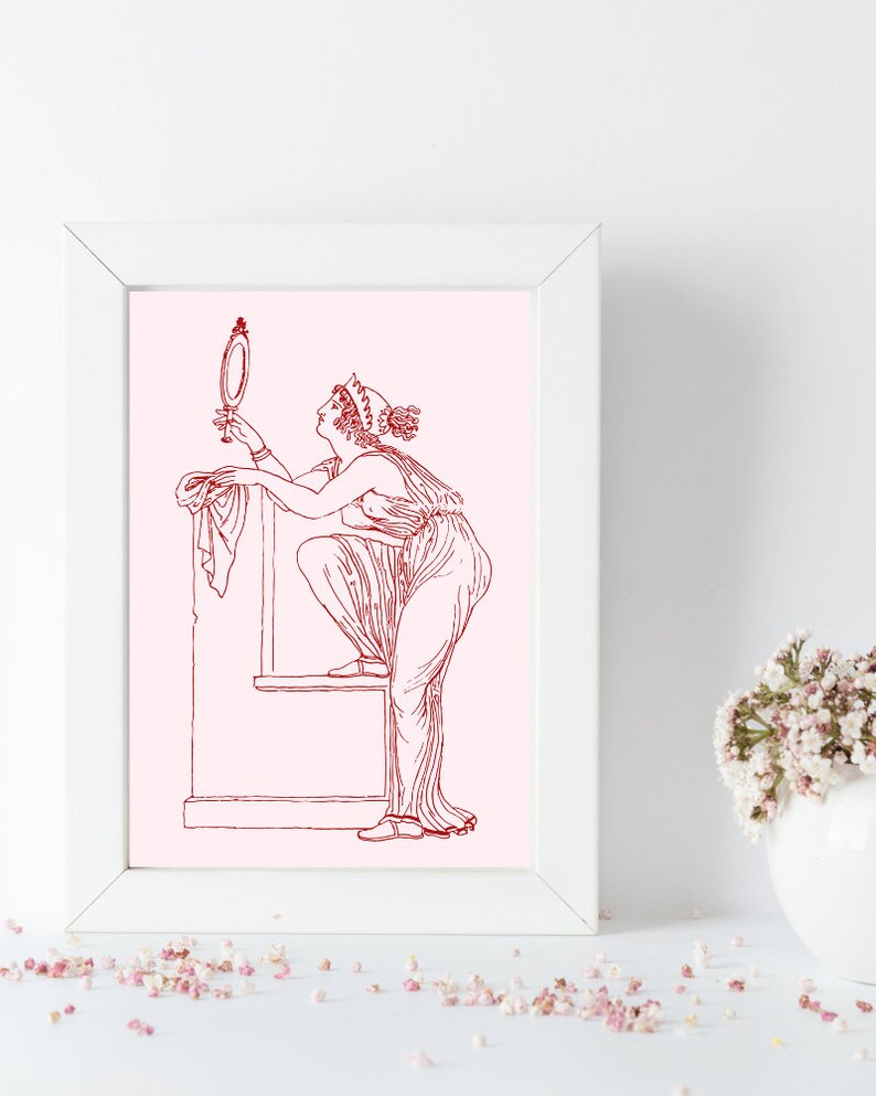 May include: A line drawing of a woman in a flowing gown, holding a hand mirror and standing on a platform. The drawing is in red on a pink background.