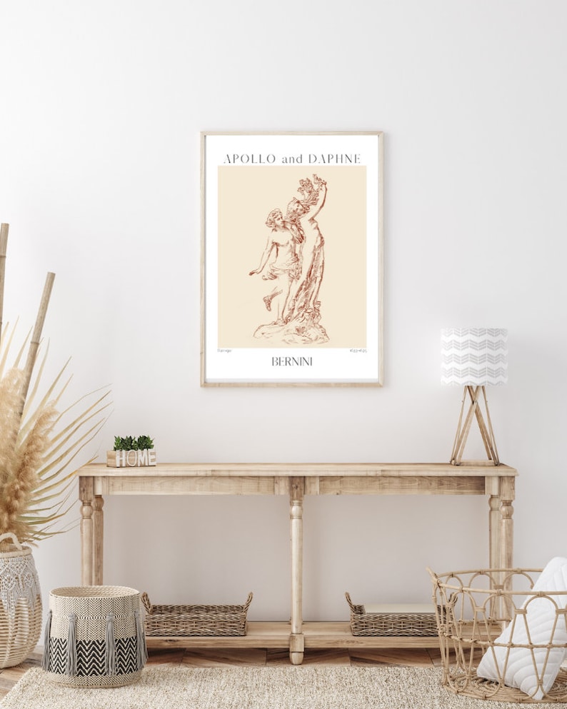 May include: A beige poster with a brown line drawing of a sculpture titled "Apollo and Daphne" by Bernini.