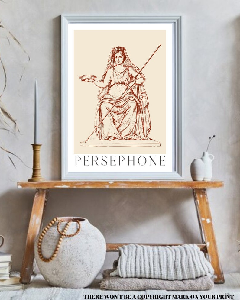 May include: A vintage illustration of Persephone, the Greek goddess of spring, in a seated pose. She is holding a bowl in her left hand and a staff in her right hand. The illustration is in a brown color and is framed in a white frame.