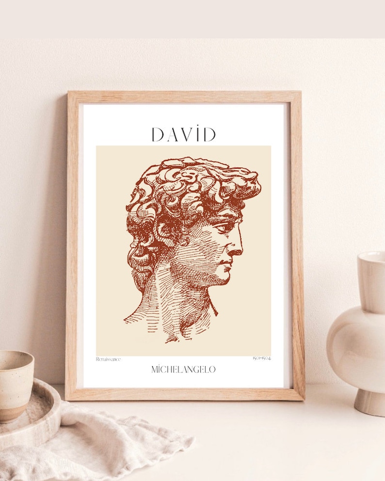 May include: A framed print of a line drawing of the David statue by Michelangelo. The print is on a cream background with the title "DAVID" in brown text at the top and "MICHELANGELO" in brown text at the bottom. The words "Renaissance" and "ROME, 1501-1504" are in smaller brown text at the bottom.