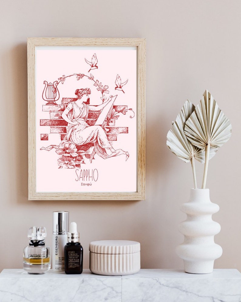 May include: A red and white illustration of Sappho, a Greek poet, sitting on a brick wall with a lyre and birds flying around her. The text "Sappho" and "&Sigma;&alpha;&pi;&phi;ώ" is below the illustration.