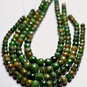 1 hebra completa---Rondel facetado de rubí verde----5,5 mm a 8 mm----Gema natural----N134