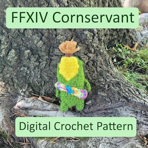 May include: A handmade green crochet figure with a yellow center and a colorful band around its waist. The figure has a brown top and is set against a tree trunk. Text on the image reads "FFXIV Cornservant" and "Digital Crochet Pattern."
