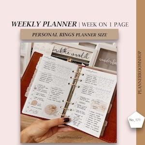 May include: A weekly planner with a white cover and gold rings. The planner is open to a weekly spread with a grid layout. The planner is labeled "weekly planner" and "today". The planner is decorated with stickers and a floral illustration.