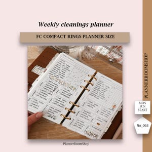 May include: A weekly cleaning planner designed for a compact ring planner. The planner features a grid layout with checkboxes for each day of the week. The planner includes a list of cleaning tasks, such as "dust all surfaces", "vacuum", and "clean the bathroom".