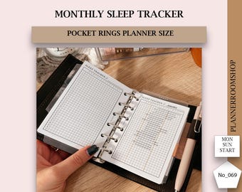 May include: A black and white printable monthly sleep tracker for a pocket-sized planner. The tracker is designed to be used with a ring binder and has a grid layout for recording sleep hours. The text "SLEEP TRACKER" is printed at the top of the page.