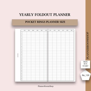 May include: A yearly foldout planner insert for pocket rings planners. The white paper features a black grid layout with months from January to December across the top and numbered days 1 through 31 along the side. Text includes YEARLY FOLDOUT PLANNER, POCKET RINGS PLANNER SIZE, PLANNERROOMSHOP, MON SUN START, and No_139.