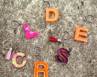 Chaveiros Iniciais em Resina