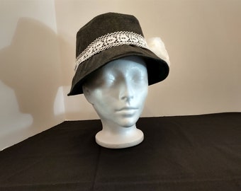 Charcoal grey hat with white rose