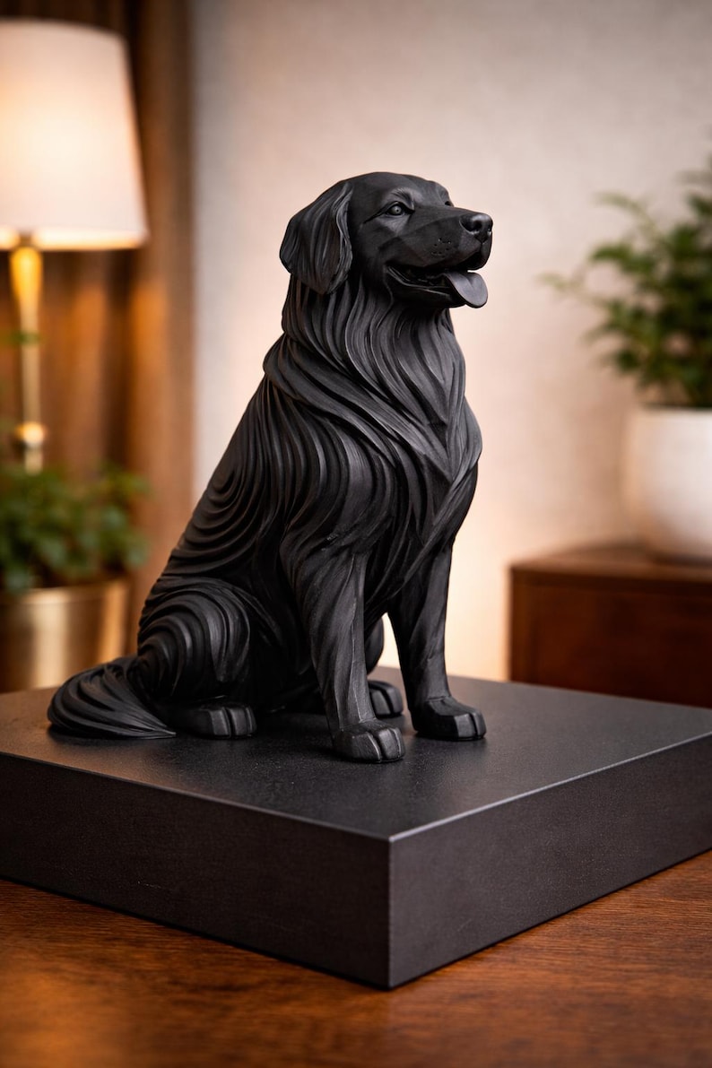 May include: A black sculpture of a dog, possibly a Golden Retriever, sitting on a black square base. The dog has detailed fur and is posed with its tongue out. The sculpture is a decorative item.