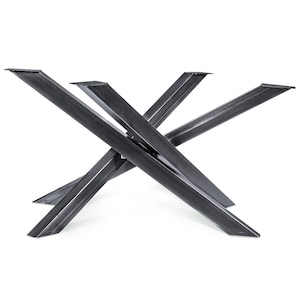 May include: A black metal table base with a unique X-shaped design. The base is made of thick, sturdy metal and has a sleek, modern look.